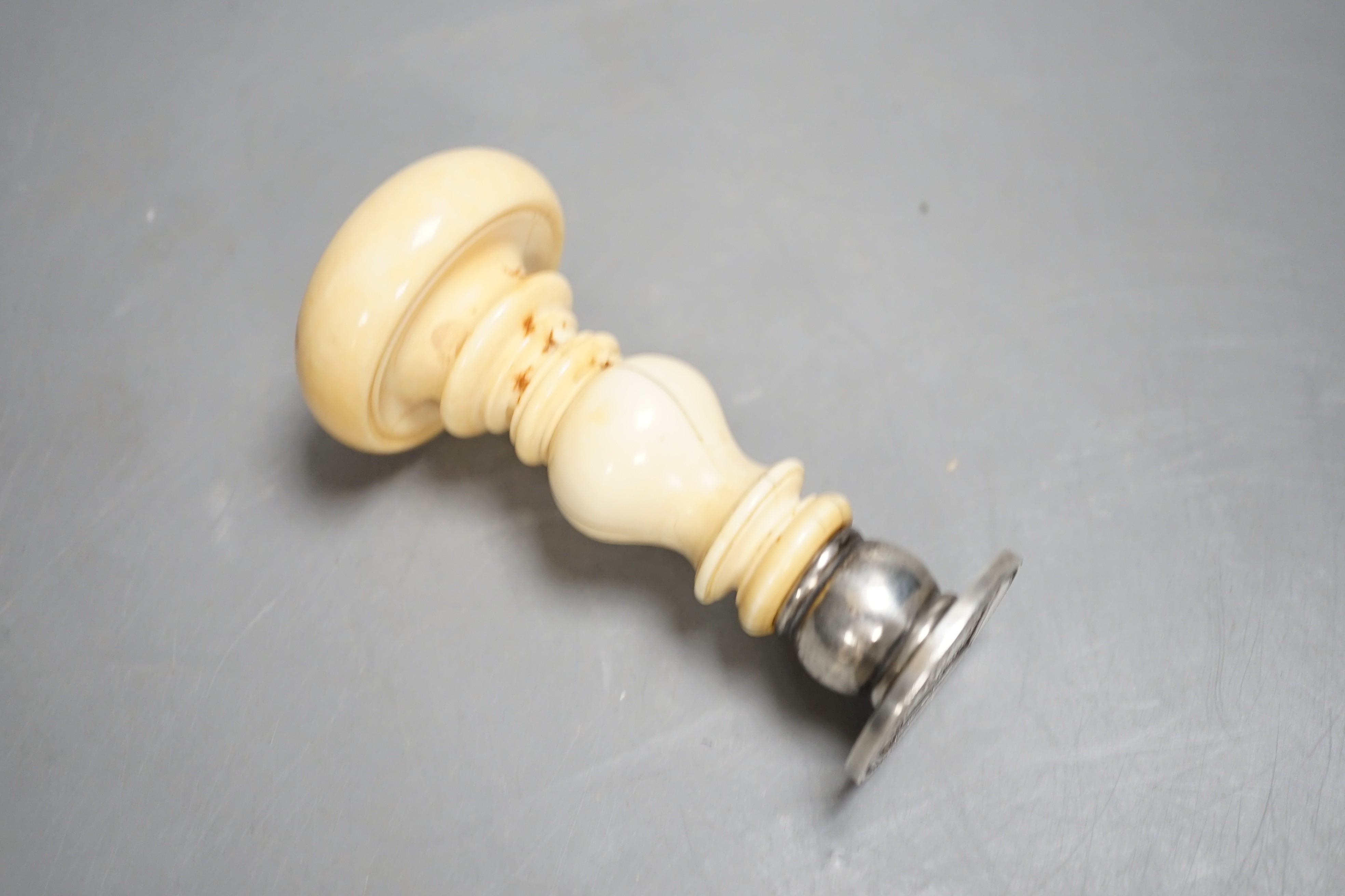 An early to mid 19th century carved ivory desk seal 9cm